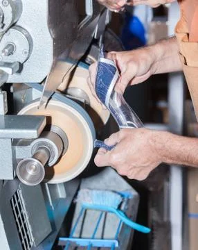 The shoemaker repairs a shoe Stock Photos