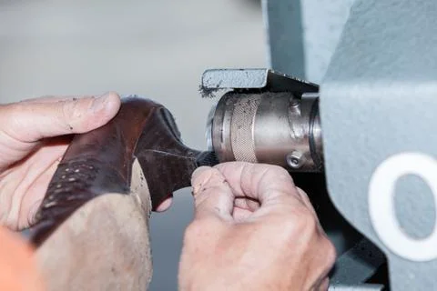 The shoemaker repairs a shoe Stock Photos