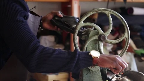 Shoemaker at work Stock Footage 104984535