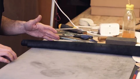 Shoemaker at work Stock Footage 111783857