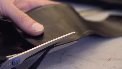 Shoemaker at work Stock Footage 111783936