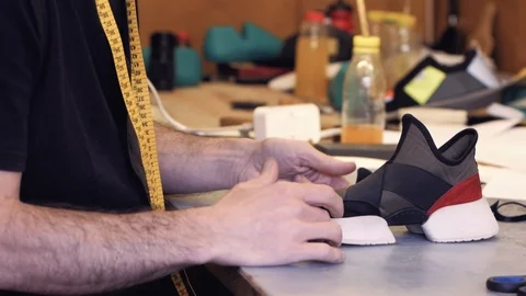 Shoemaker at work Stock Footage 111784158