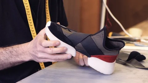 Shoemaker at work Stock Footage 111784196