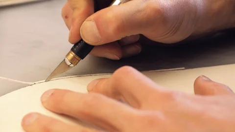 Shoemaker at work Stock Footage 111784406