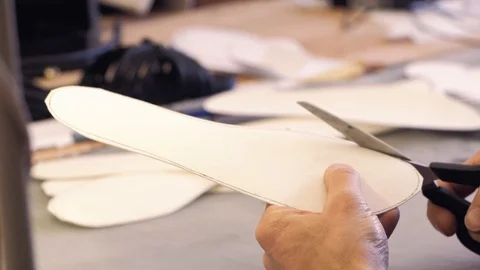 Shoemaker at work Stock Footage 111784609