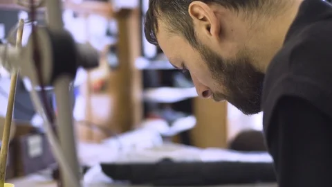Shoemaker work process Stock Footage 106419934