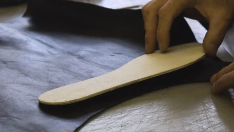 Shoemaker work process Stock Footage 106420369