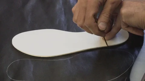Shoemaker work process Stock Footage 106420444