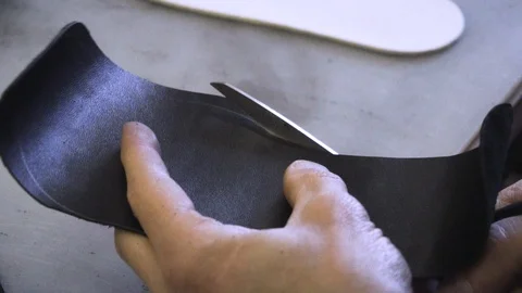 Shoemaker work process Stock Footage 106420494