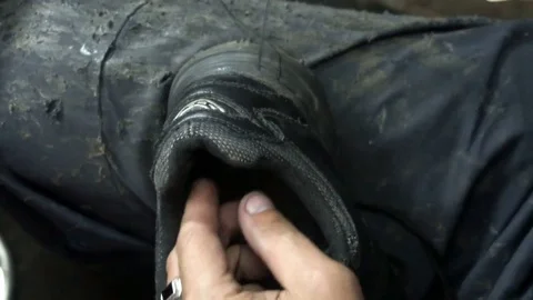 The shoemaker at work.The process of repairing shoes in workshop Stock Footage 77919932