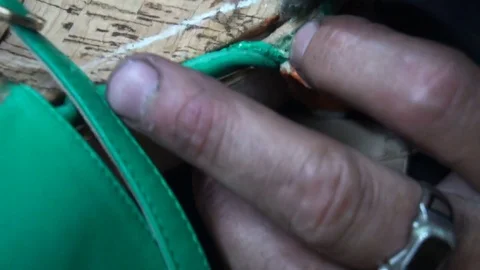 The shoemaker at work.The process of repairing shoes in workshop Stock Footage 77923673