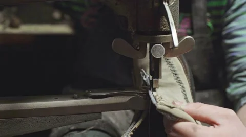 Shoemaker at work. Slow motion. Video stock 59911510