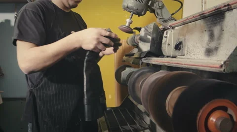 Shoemaker works in his lab Stock Footage 61769312