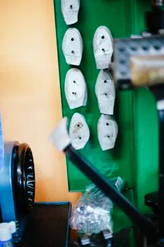 Shoemaker workshop machine to reshoke shoes Stock Photos