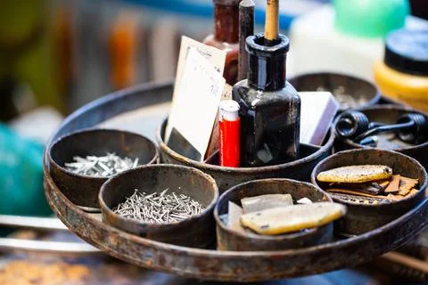 Shoemaker workshop with master shoemaker, old-fashioned workshop, orthopedic Stock Photos