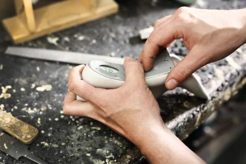 Shoemaker's workshop, append heels Stock Photos