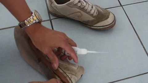 Shoes with adhesive stickers Stock Footage 64578219