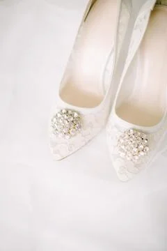The shoes of the bride. Stock Photos