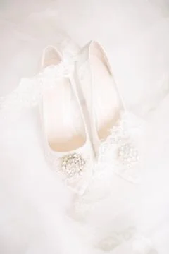 The shoes of the bride. Stock Photos