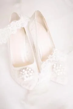 The shoes of the bride. Stock Photos