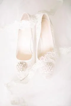 The shoes of the bride. Stock Photos