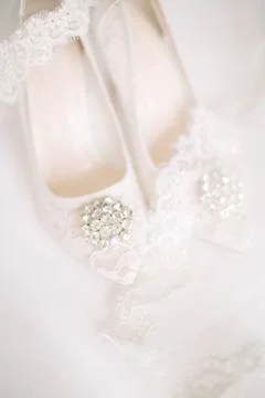 The shoes of the bride. Stock Photos