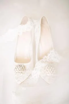 The shoes of the bride. Stock Photos