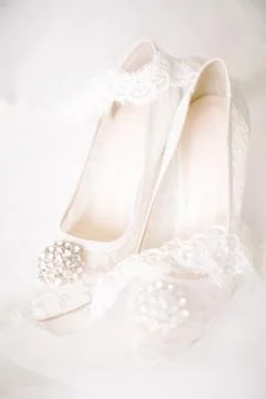 The shoes of the bride. Stock Photos