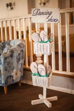 Shoes for dancing in baskets at a wedding Stock Photos