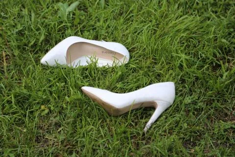 Shoes on the grass Stock Photos