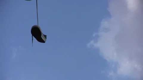 Shoes Hanging On Wire Close Up Stock Footage 1067668