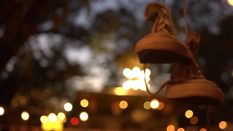 Shoes Hanging on Wire 動画素材 83838043