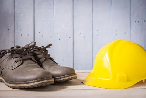 Shoes with hard hat Stock Photos
