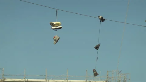 Shoes on power lines | Stock Video | Pond5