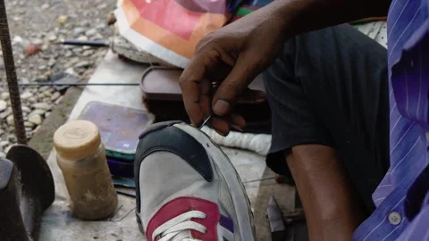Shoes Stiching by hand in india Stock Footage 317307232