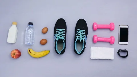 Shoes stop motion - close up of objects for exercise on gray background. Stock Footage 98129212