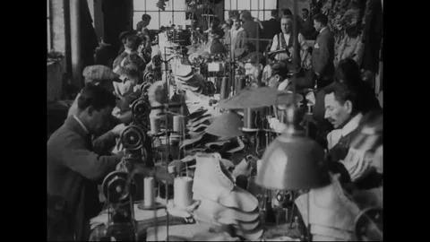 Shoes take shape and structure as the pieces are sewn together - 1914-1918 Stock Footage 83700443