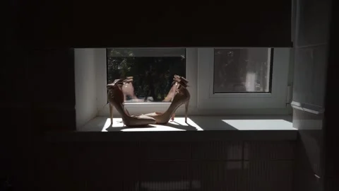 Shoes on the windowsill Stock Footage 163567788