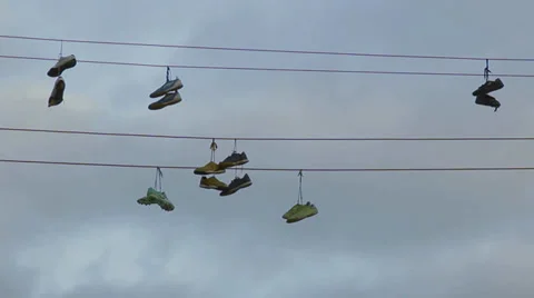 Shoes on wire Stock Footage 34286959