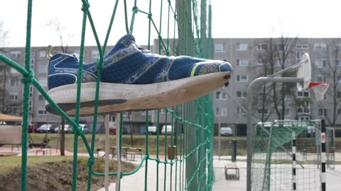 Shoes on wire Stock Footage 172532889