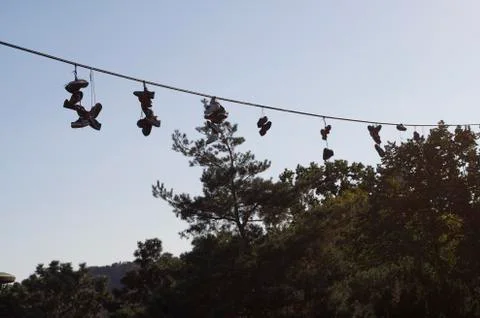 Shoes on a wire Fotos de archivo
