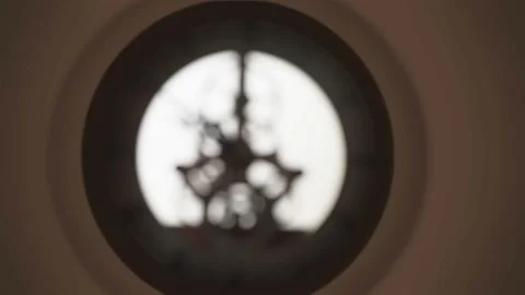 Shoot the clock in Backlight ,time passes as the clock gears turn. Stock Footage 162653211