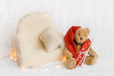 Shoot set up with sofa, teddy bear and garland Stock Photos