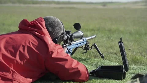 Shooter performs the exercise competitions in high-precision shooting Stock Footage 243798398