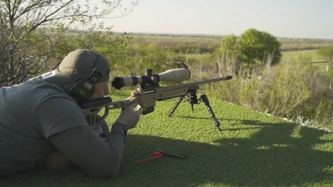 The shooter performs a high-quality exercise with a sniper rifle Video stock 243486380