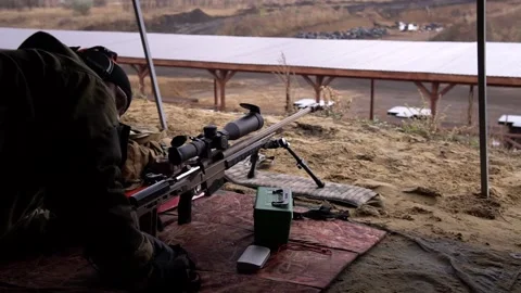 The shooter is preparing for a sniping competition Stock Footage 229548490