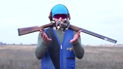 Shooter throws bullets  slow motion Video stock 60616260