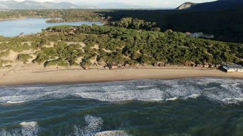 Shooting from above with drone Beach and lake of Sabaudia Circeo National Park Stock Footage 147677853