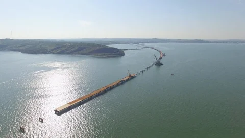 Shooting from the air of building process of Kerch bridge, Crimea Видео 113416287