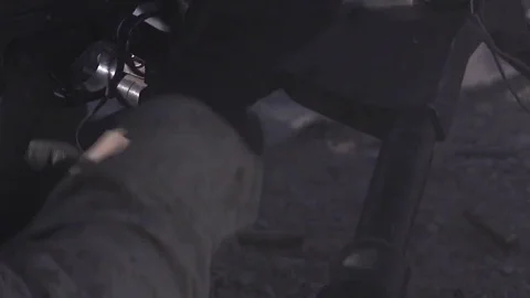 Shooting and reloading a machine gun, charges the tape Stock Footage 120833999